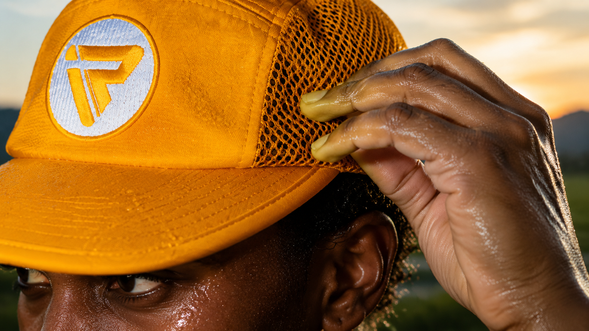 Close-up of an Inspired Runner performance hat